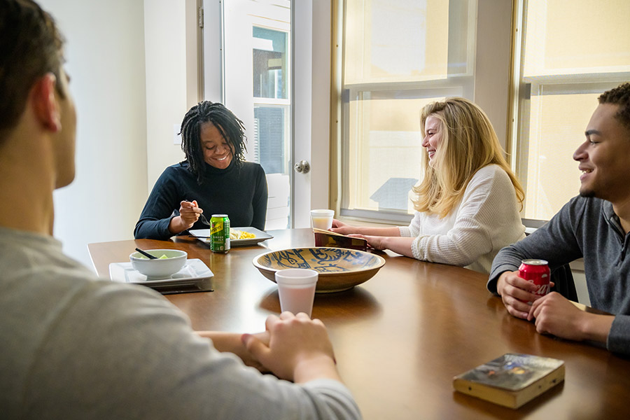 group of patients at meal time together talking about detoxing from codeine in Boston